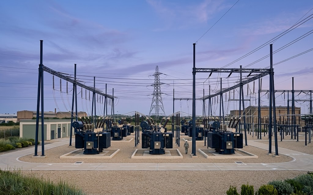 High-voltage electrical substation at dusk